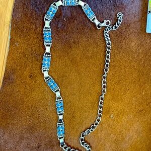 Adjustable belt.    Turquoise